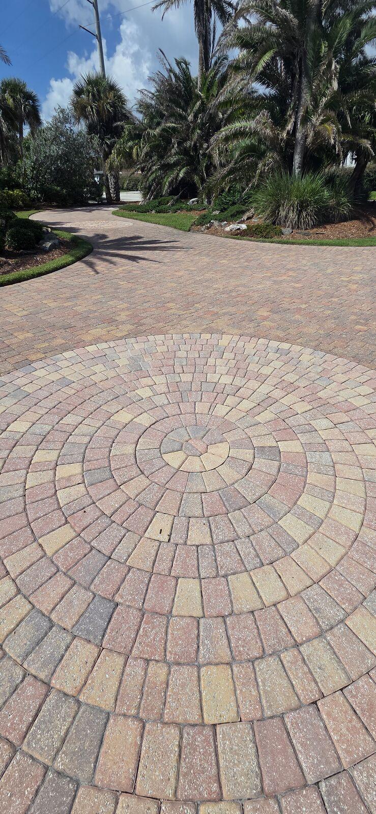 Circular paver patio pressure-washed clean