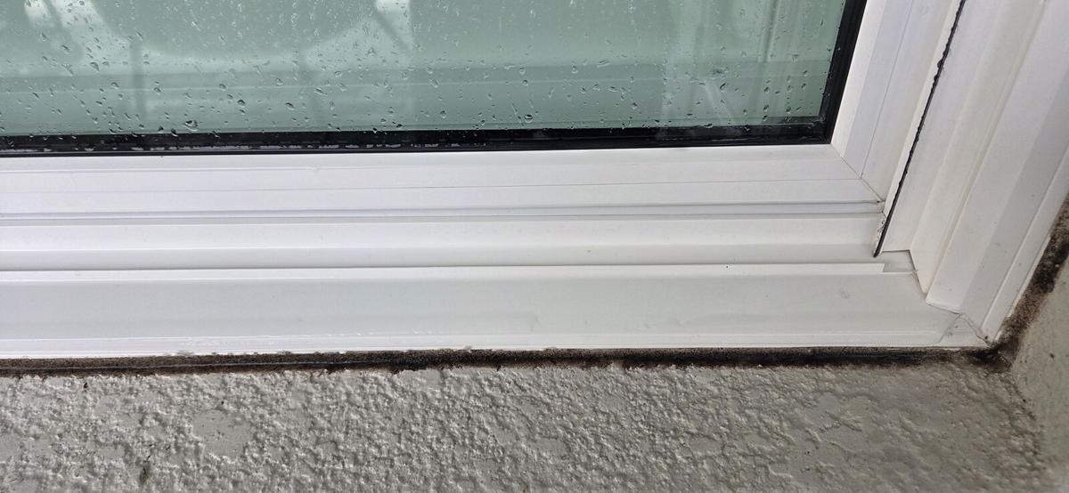 Window sill and frame wiped clean after a window cleaning