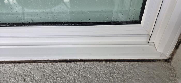 Window sill and frame wiped clean after a window cleaning